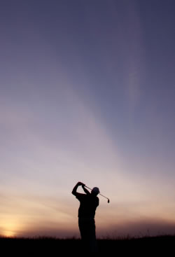 sillouhette of Golfer