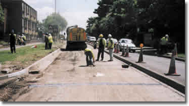 Denso Paving Tape used to seal all seams prior to laying asphalt - A5 road, Dunstable, UK